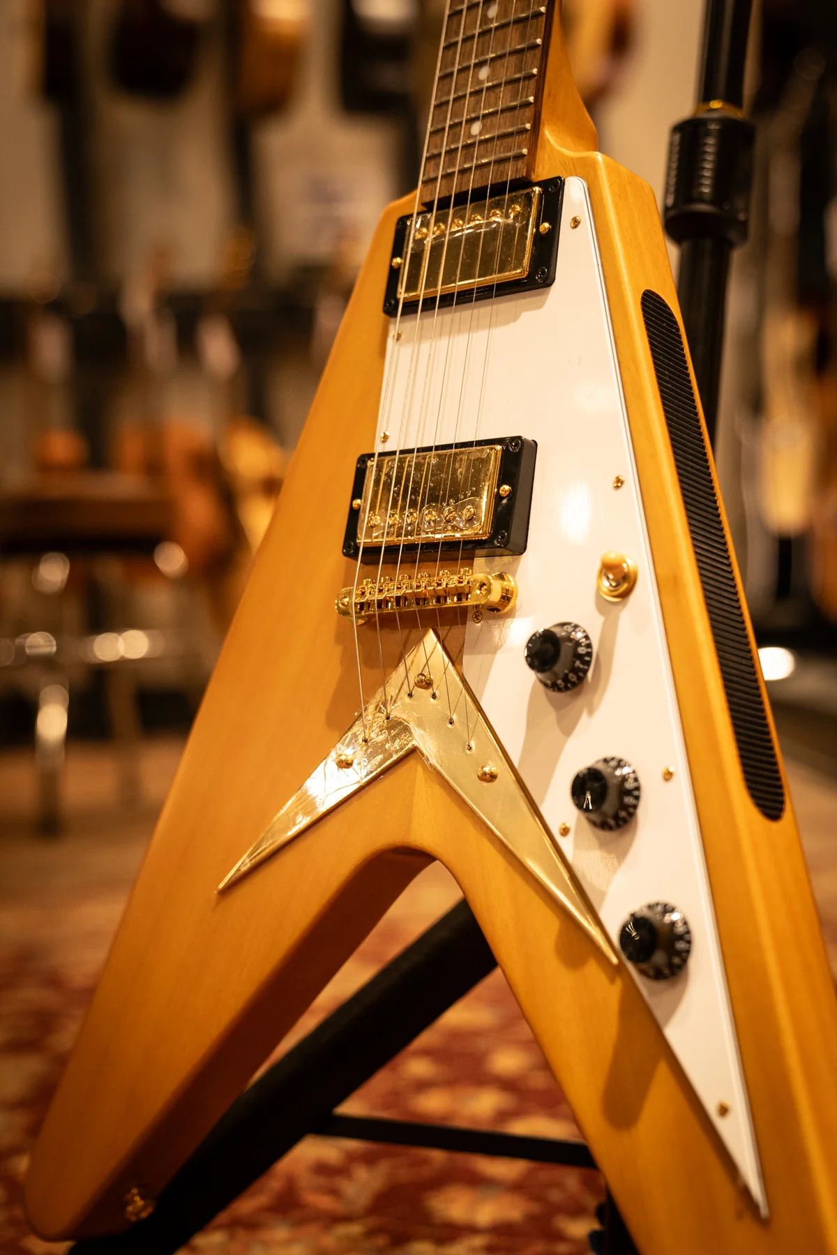 Epiphone 1958 Korina Flying V pickups and vintage-style bridge hardware.